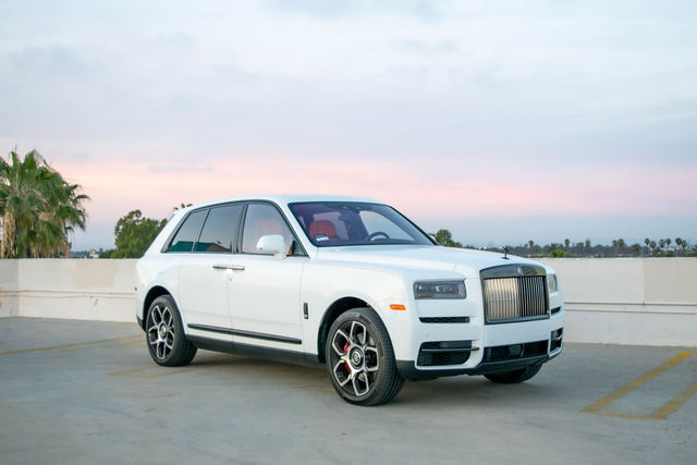 Rent White Rolls-Royce Cullinan Orange